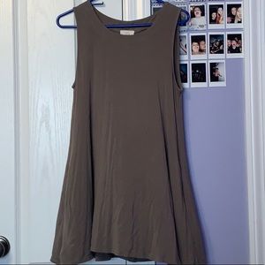 green sleeveless shirt